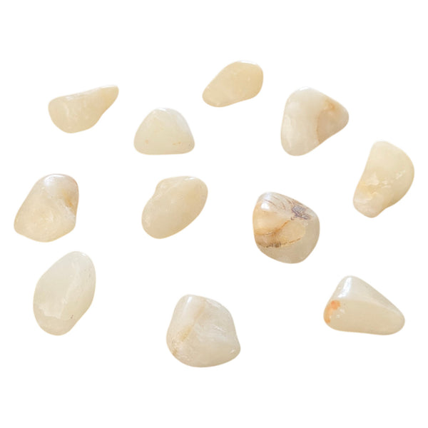 Alabaster tumblestones showing yellow and cream tones. 