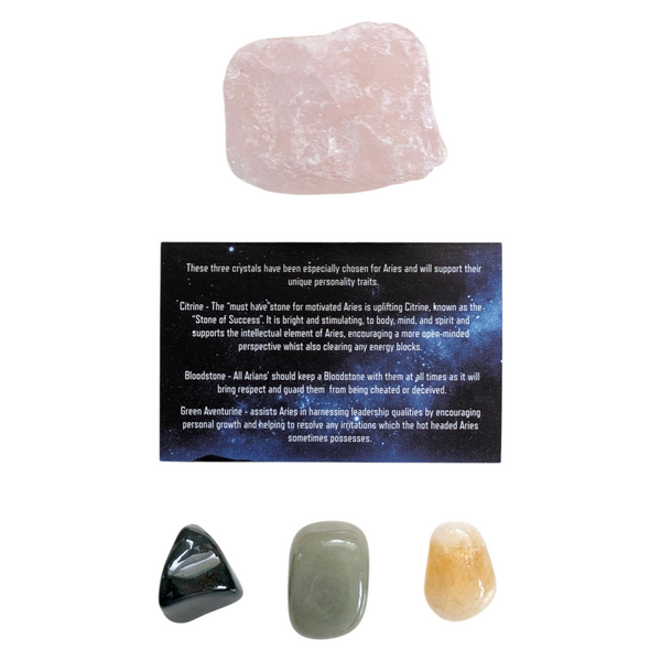 Three crystal tumblestones for Aries; bloodstone, citrine and green aventurine with a card detailing their meaning and a piece of raw rose quartz. 