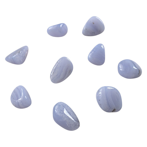 Blue Lace Agate stones showcasing light blue hues and banding.