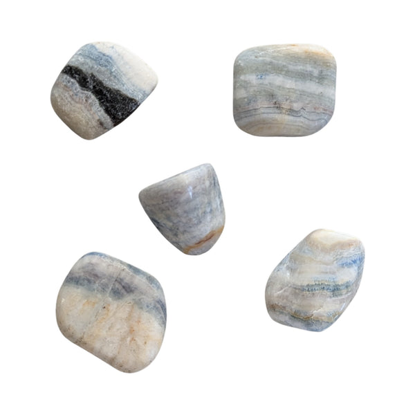 Blue scheelite polished stones showing blue calcite inclusions in a white dolomite base. 
