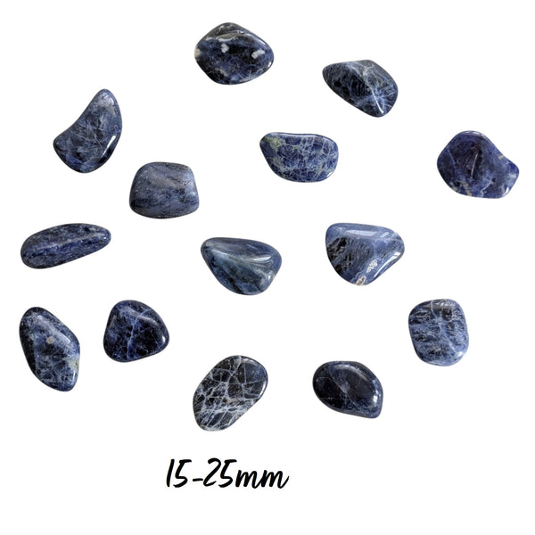 Tumbled Blue Sodalite stones measuring 15-25mm, showing white veins on a blue base rock