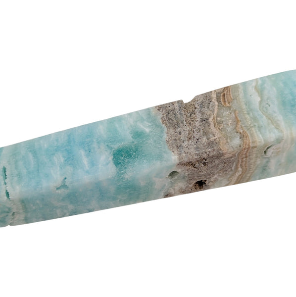 Close up of a Caribbean Calcite generator point, showing the natural cavity druzys. 
