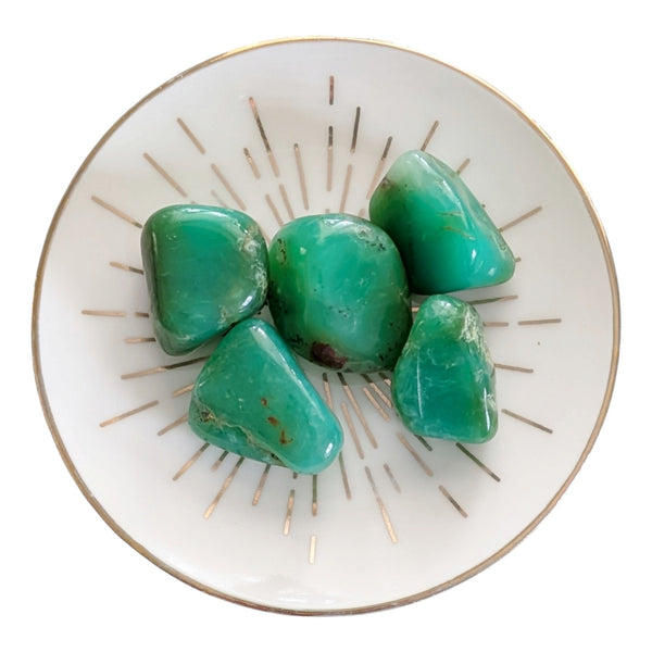 rare apple-green chrysoprase tumbled stones measuring 20-25mm. 