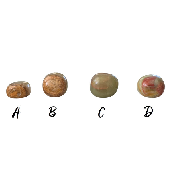 green onyx tumbled stones showing green and brown inclusions