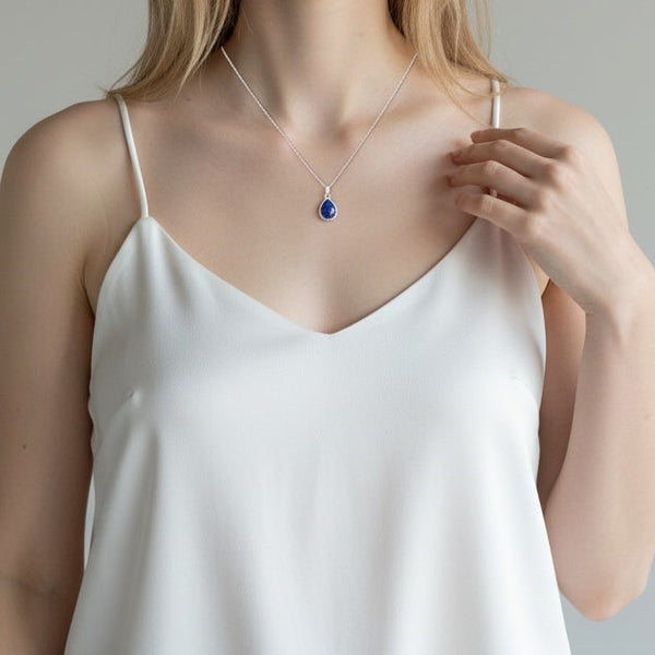 Woman wearing Lapis Lazuli Crystal Necklace