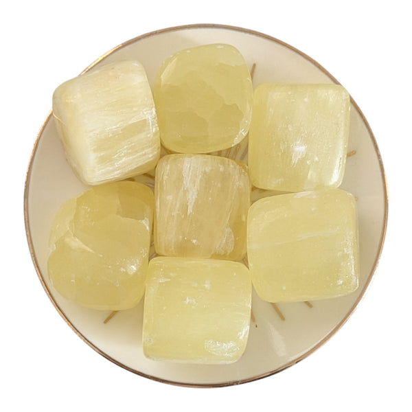Lemon calcite crystal tumblestones measuring 20-30mm, which are chunky. 