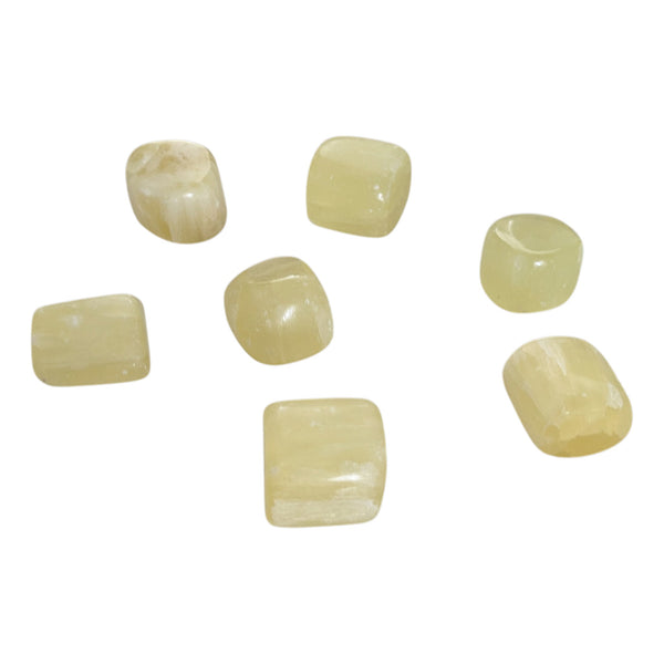 Lemon calcite crystal gemstones showing varying shades of yellow. 