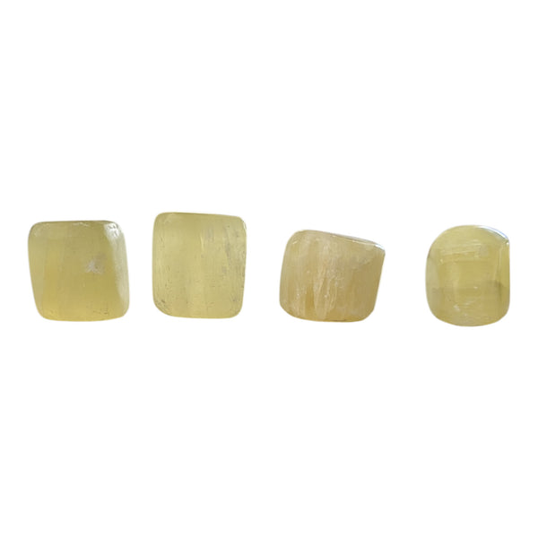 Yellow Lemon Calcite stones showing their chunky shape. 