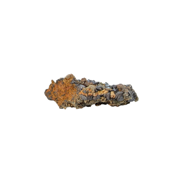 Jet-black octahedral crystals of metallic Magnetite firmly anchored on its native igneous rock matrix. The crystals sit on a classic granular, altered hornblende/pyroxene (Syenite).