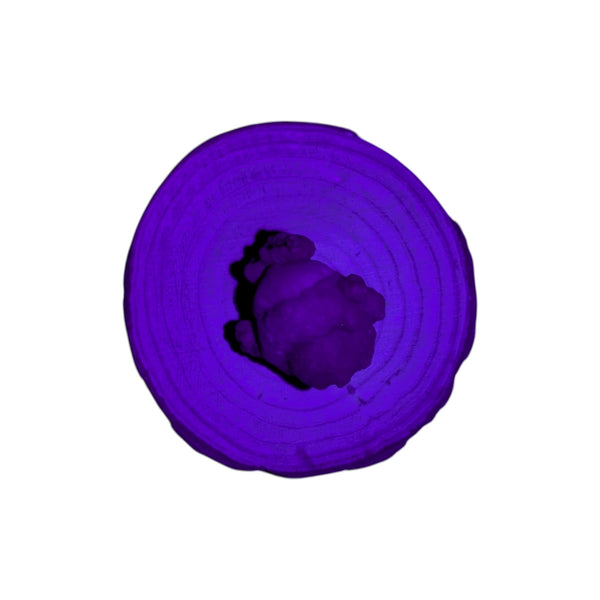 Nebula Chalcedony Cluster showing how it fluoresces under UV light. 