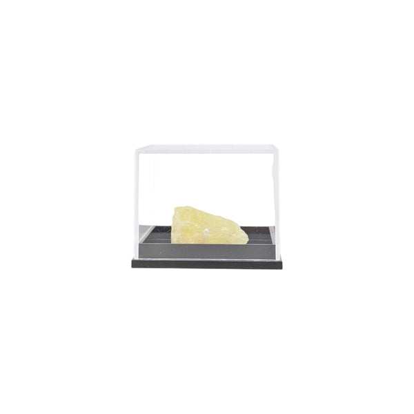 Yellow Danburite specimen placed in a small clear display case.