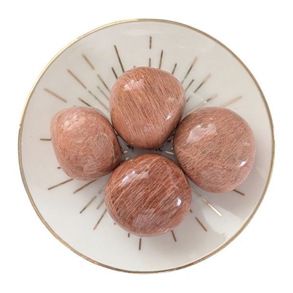 Peach Moonstone crystal tumblestones from Madagascar measuring 20-30mm.