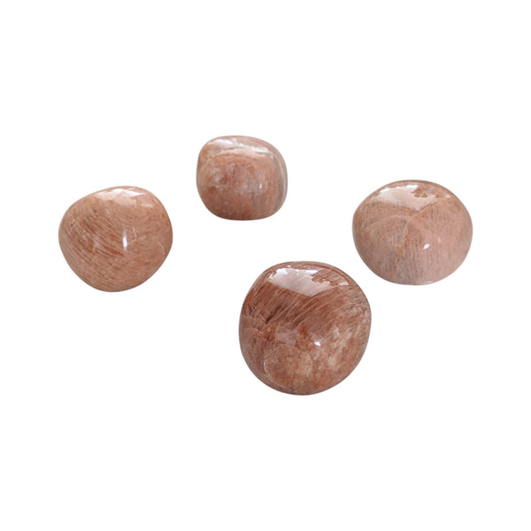 Peach Moonstone polished pocket stones in varying sizes between 20-30mm.