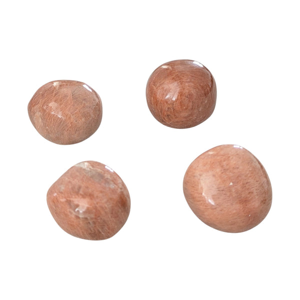 Rounded peach coloured Moonstone crystal tumblestones.