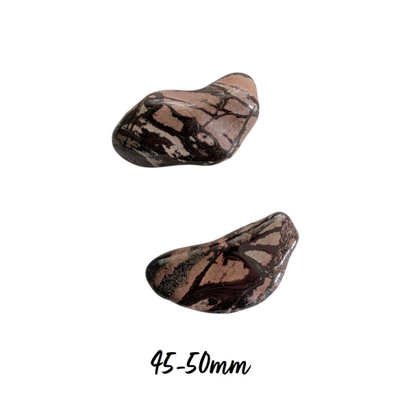 Tumbled Pink Spider Web Jasper crystals measuring 45-50mm. 