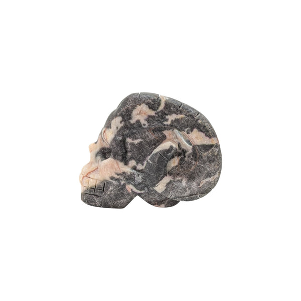 horned skull ornament made of pink zebra jasper