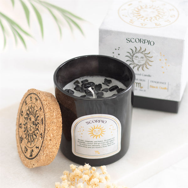 Scorpio crystal candle in a glass jar and gift box.