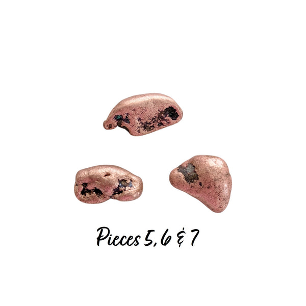 Three small pieces of Native copper which are classic, highly rounded nuggets that range from 13 grams to 19 grams each, measuring between 20-30mm.