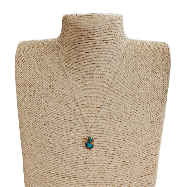 Spiny Oyster Turquoise Necklace on a bust mannequin. 