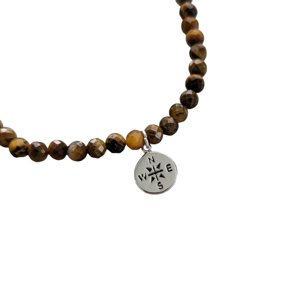 925 Sterling Silver Compass charm on a tigers eye beaded bracelet. 